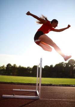 hurdling woman