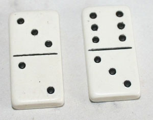 One domino with 3 and 2 spots and another with 6 and 3 spots.